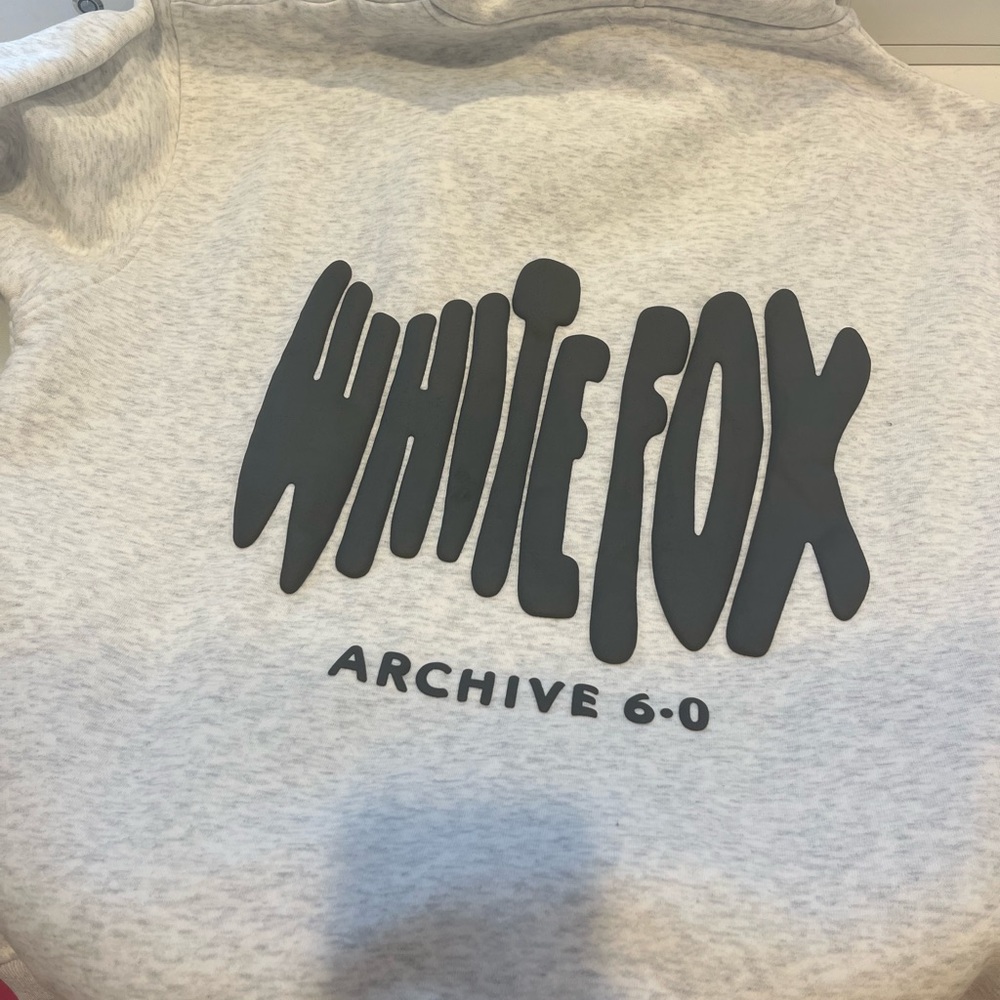 Grey and white white fox hoodie medium to large